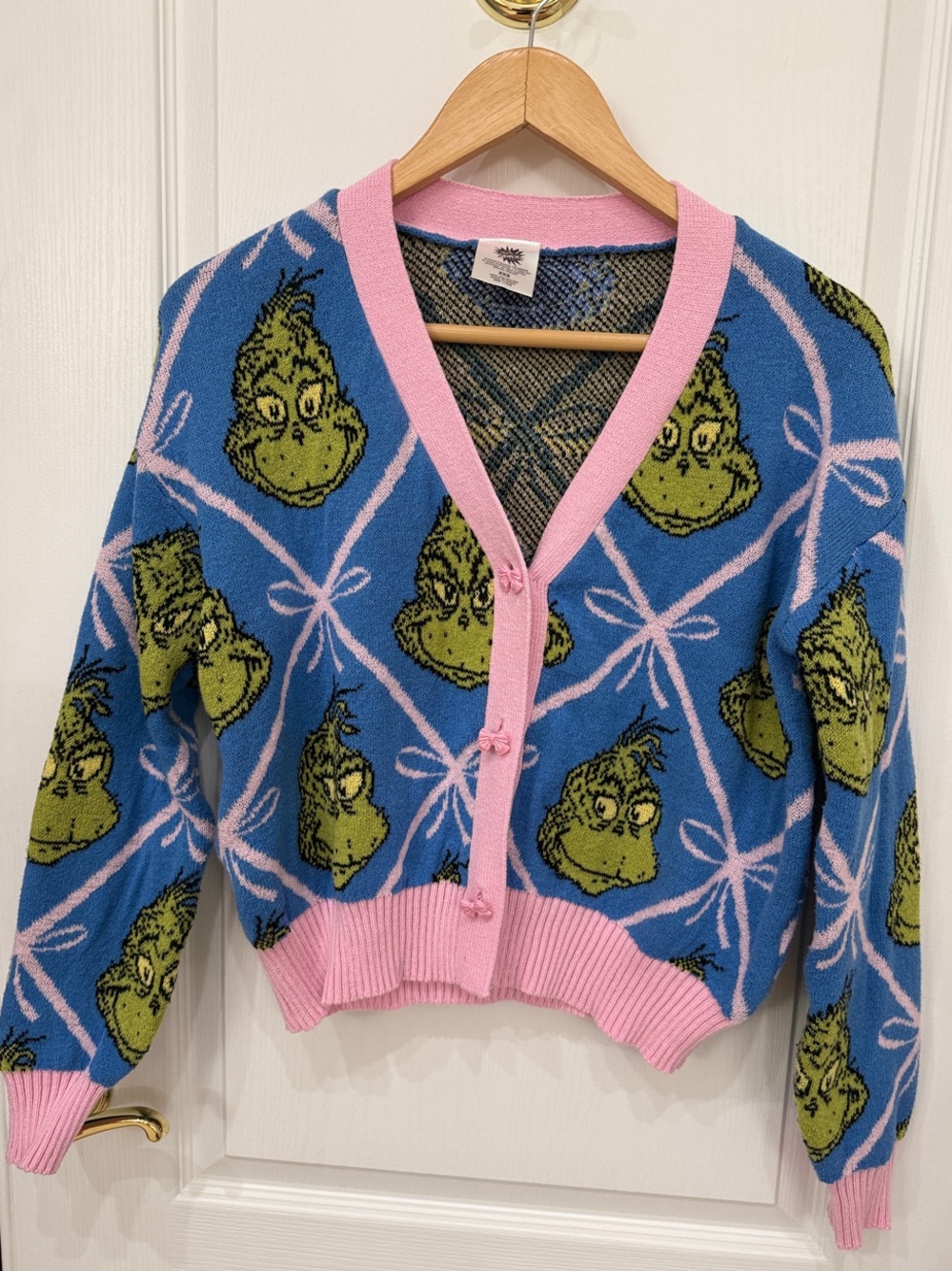 Dr. Seuss Blue Cardigan with Pink Trim, Bows and Green Grinch Motifs
